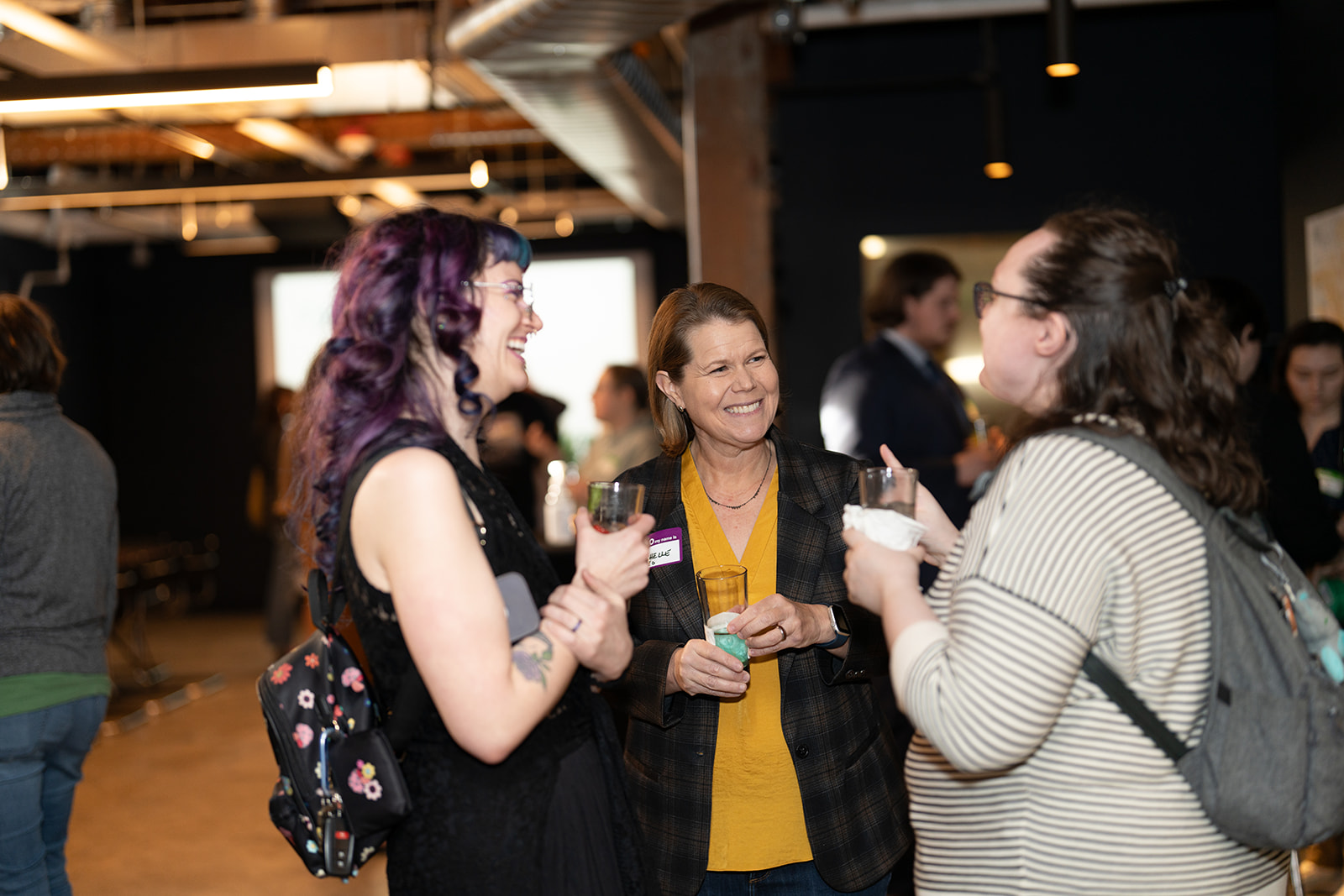 Michelle, Amira and Megan at the 2024 Milestone Event