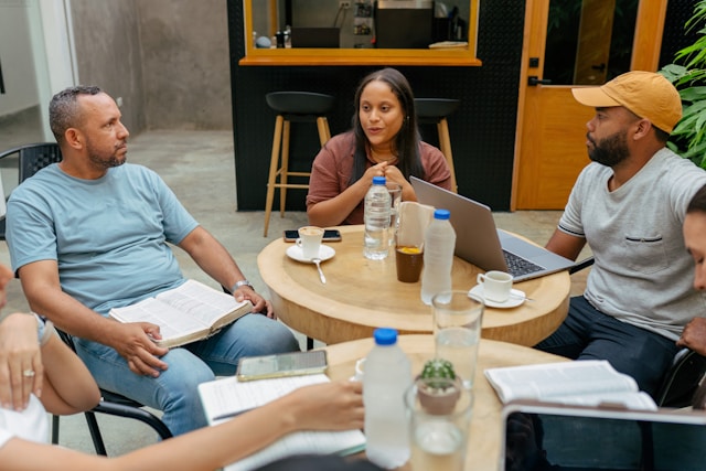 Group working around a table (Andy Quezeda for Unsplash)