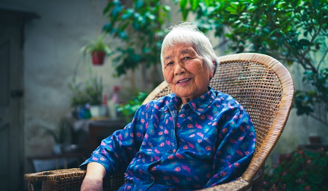 Older asian woman in garden