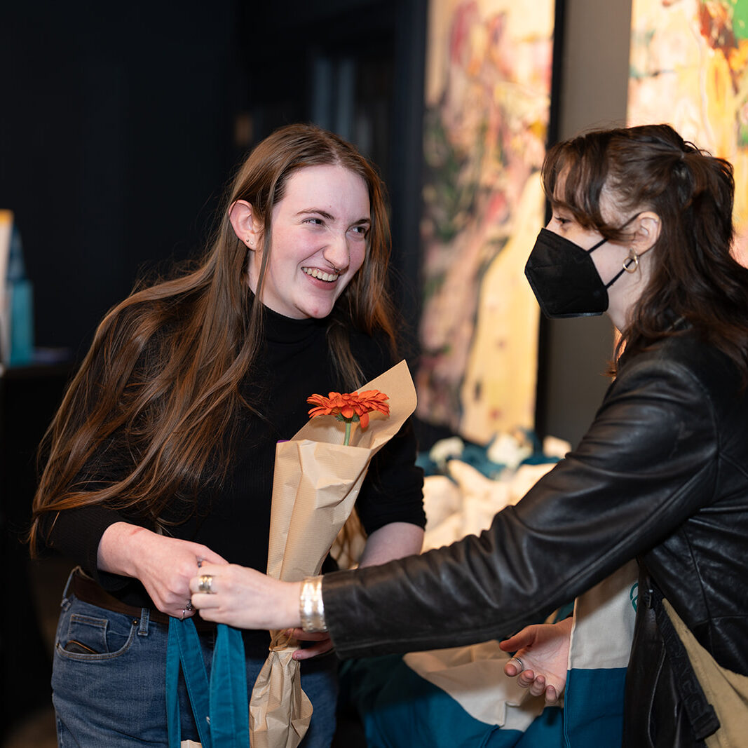 Teen Link volunteer receiving an award at Crisis Connections 2024 Milestones Event