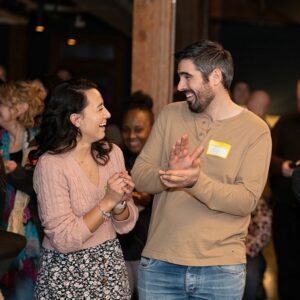 Folks chatting at Crisis Connections Milestone Event