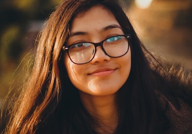 Young woman with glasses (Shirish Suwal on Unsplash)